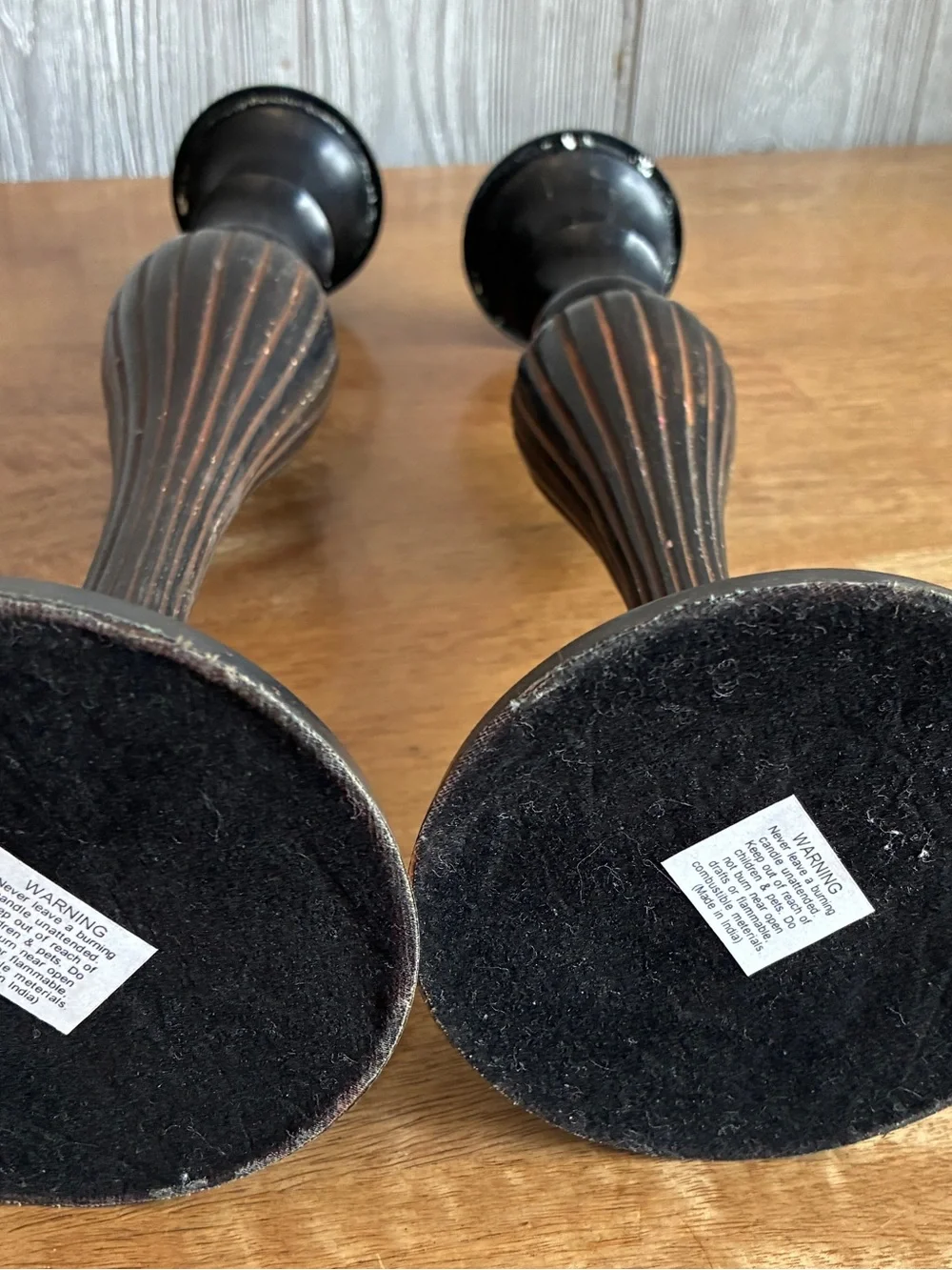 Vintage like Black Metal Candlesticks with Red Ribbed Taper Candles. Very heavy